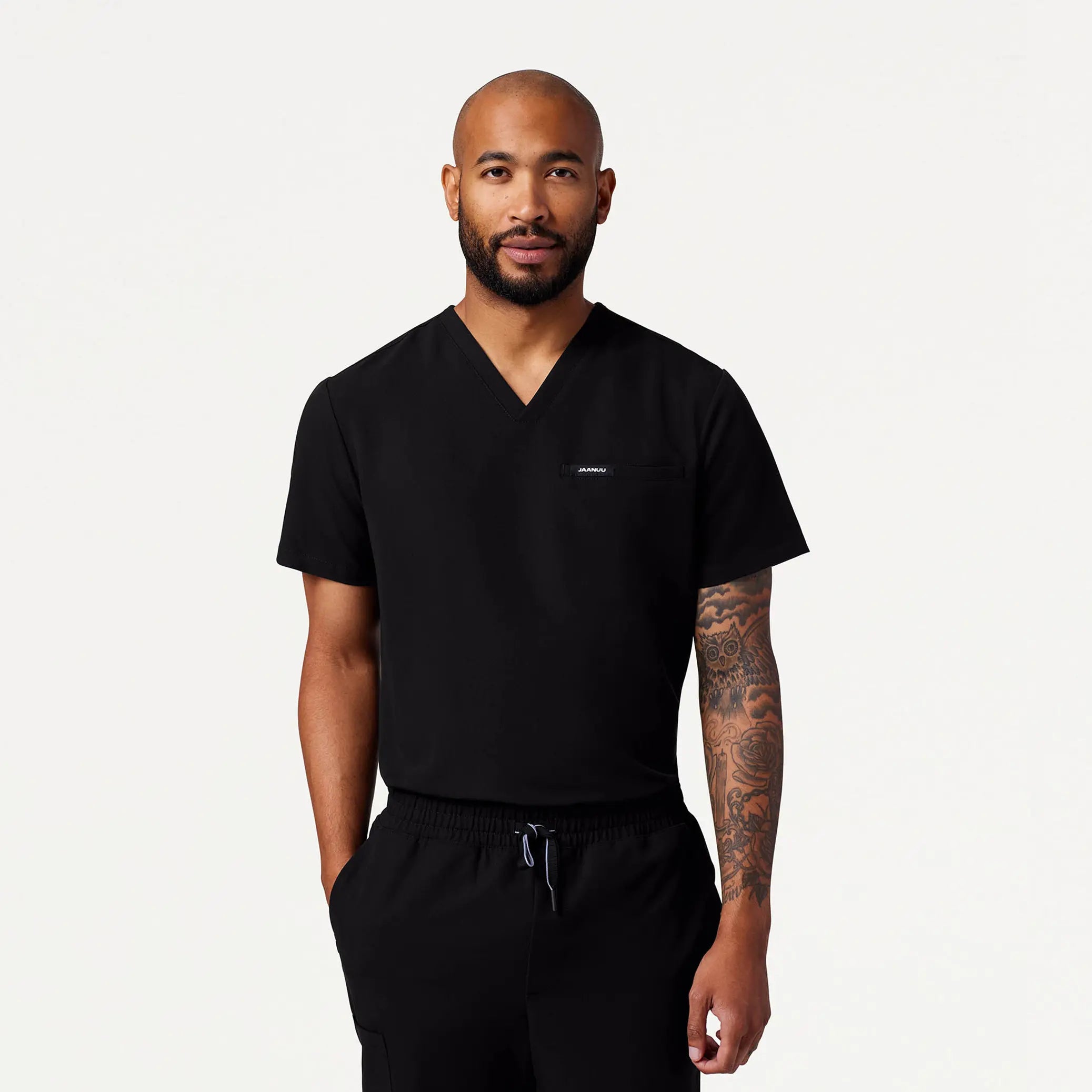 Weekend Shopping Made Better Jaanuu Men's Romin 1-Pocket Scrub Top - Black